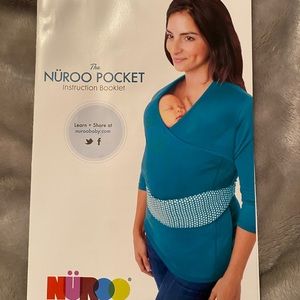 Nuroo baby wearing shirt
